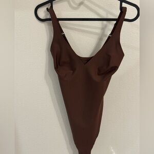 SKIMS Brown bodysuit. Core sculpt plunge thong bodysuit. Worn once! Size S